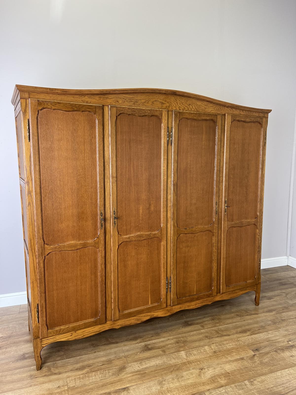 Wardrobe Vintage French Style Oak Four Door Carved Armoire (1 of 10) Wardrobe Vintage French Style Oak Four Door Carved Armoire (1 of 10)
