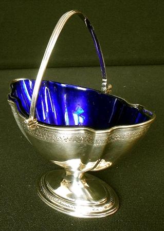 A Solid Silver Swing-handled Sugar Basket by William Vincent, London 1784 (1 of 7)