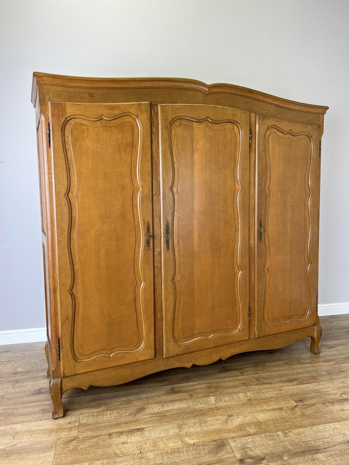 Wardrobe Vintage French Oak Triple Door Carved Armoire (1 of 14) Wardrobe Vintage French Oak Triple Door Carved Armoire (1 of 14)