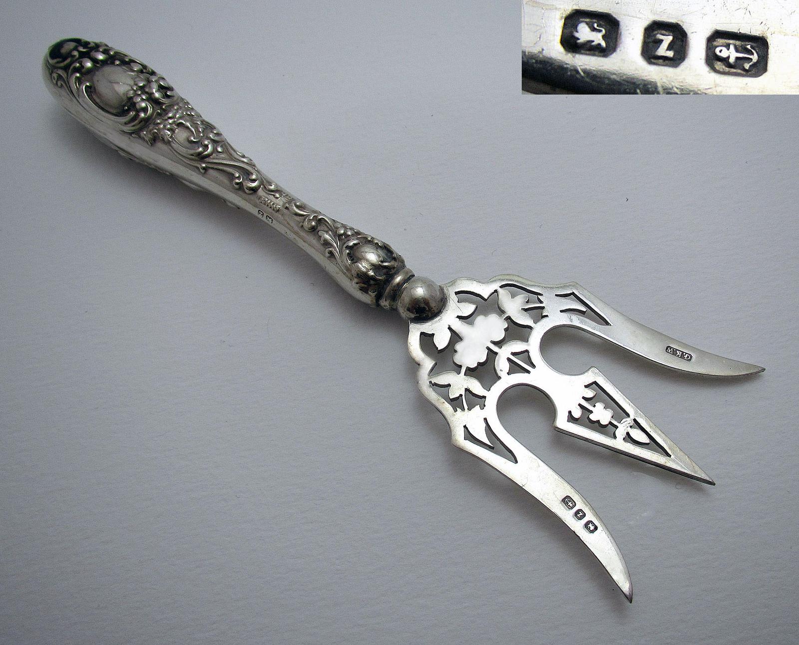 Beautiful Victorian 1899 Solid Sterling Silver Antique Repousse Bread Muffin Cake Fork Server (1 of 8) Beautiful Victorian 1899 Solid Sterling Silver Antique Repousse Bread Muffin Cake Fork Server (1 of 8)