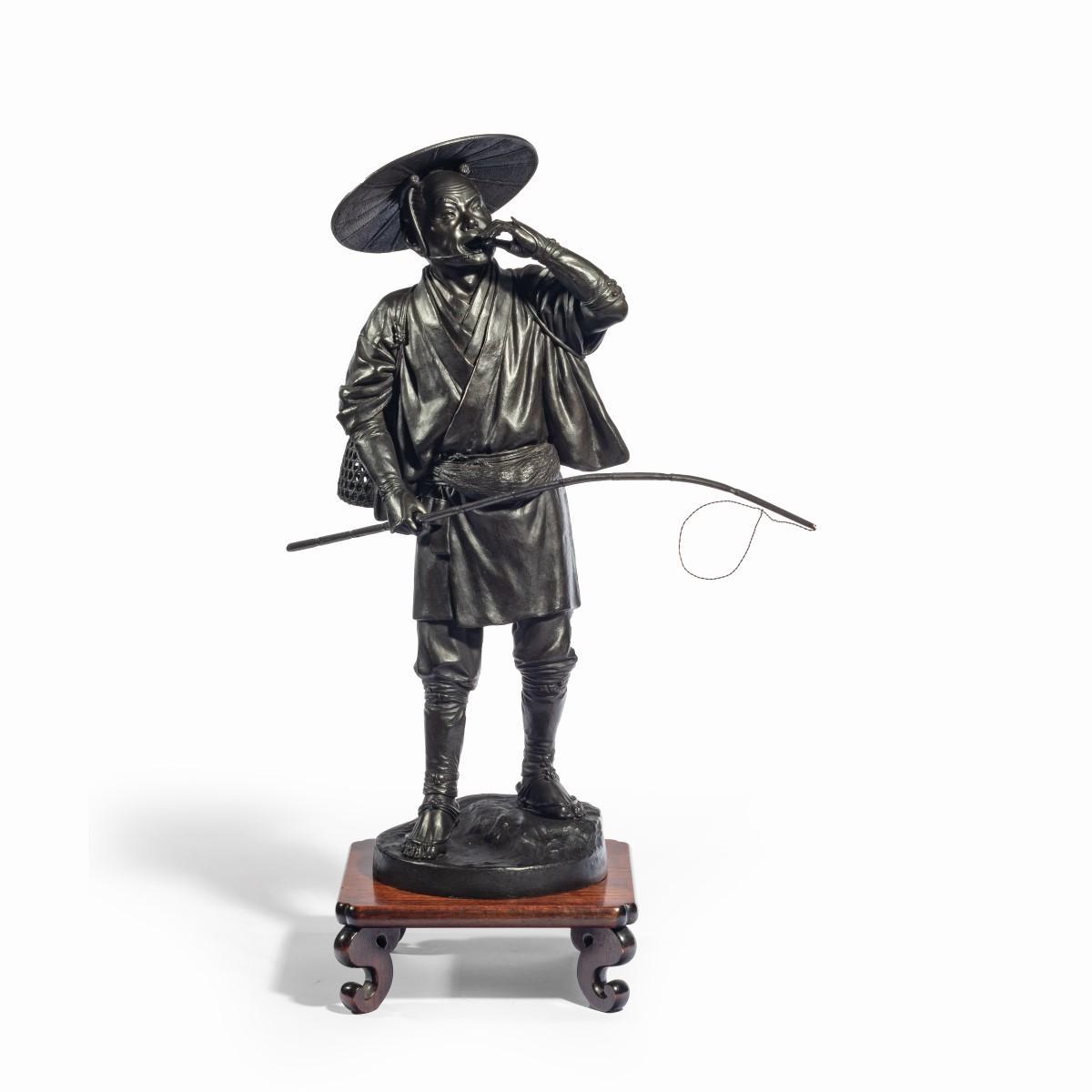 A Meiji period bronze of a cricket catcher (1 of 14)