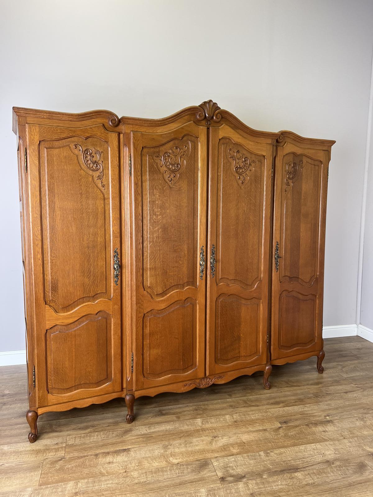 Wardrobe Vintage French Style Oak Four Door Carved Armoire (1 of 13) Wardrobe Vintage French Style Oak Four Door Carved Armoire (1 of 13)