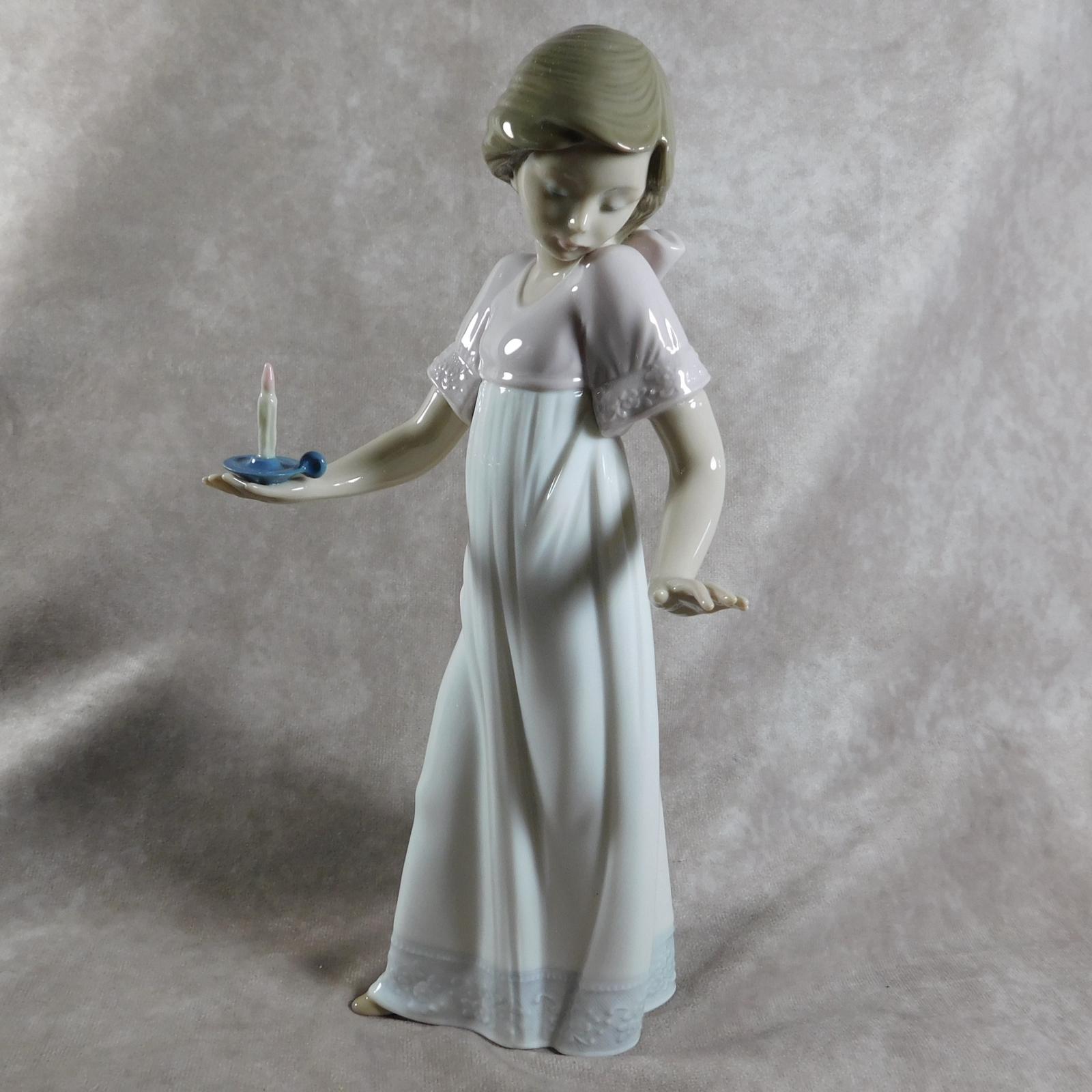 "Nina Con Palmatora" or "To Light The Way" Hand Modelled Porcelain Figure by Nao (1 of 1)