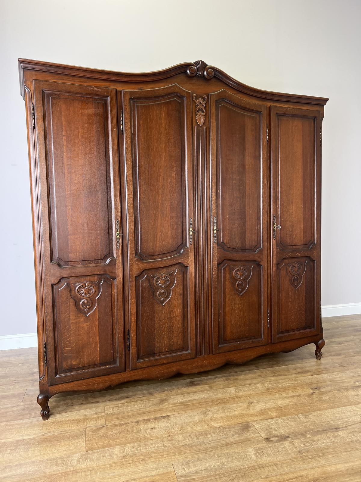 Wardrobe Vintage French Style Oak Four Door Carved Armoire (1 of 12) Wardrobe Vintage French Style Oak Four Door Carved Armoire (1 of 12)