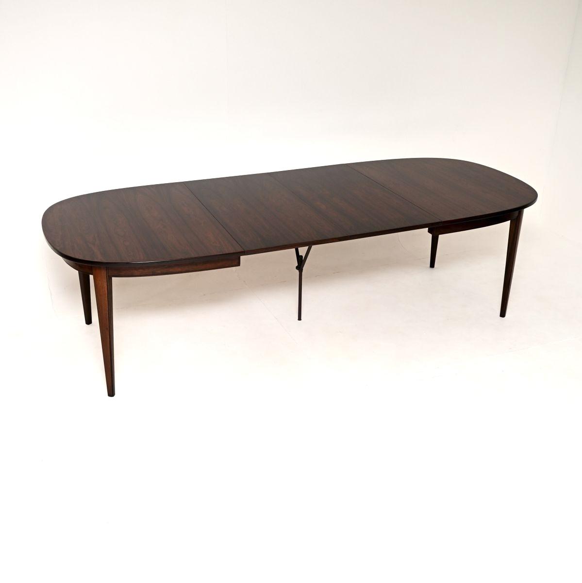 Danish Vintage Rosewood Dining Table by Gunni Omann (1 of 10) Danish Vintage Rosewood Dining Table by Gunni Omann (1 of 10)