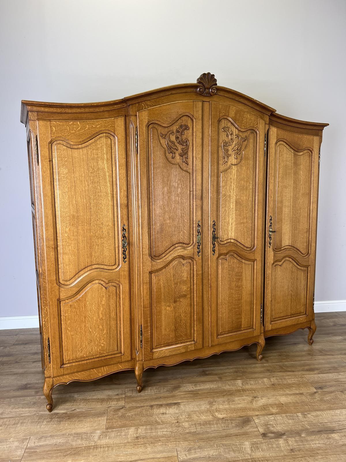 Wardrobe Vintage French Style Oak Four Door Carved Armoire (1 of 11) Wardrobe Vintage French Style Oak Four Door Carved Armoire (1 of 11)