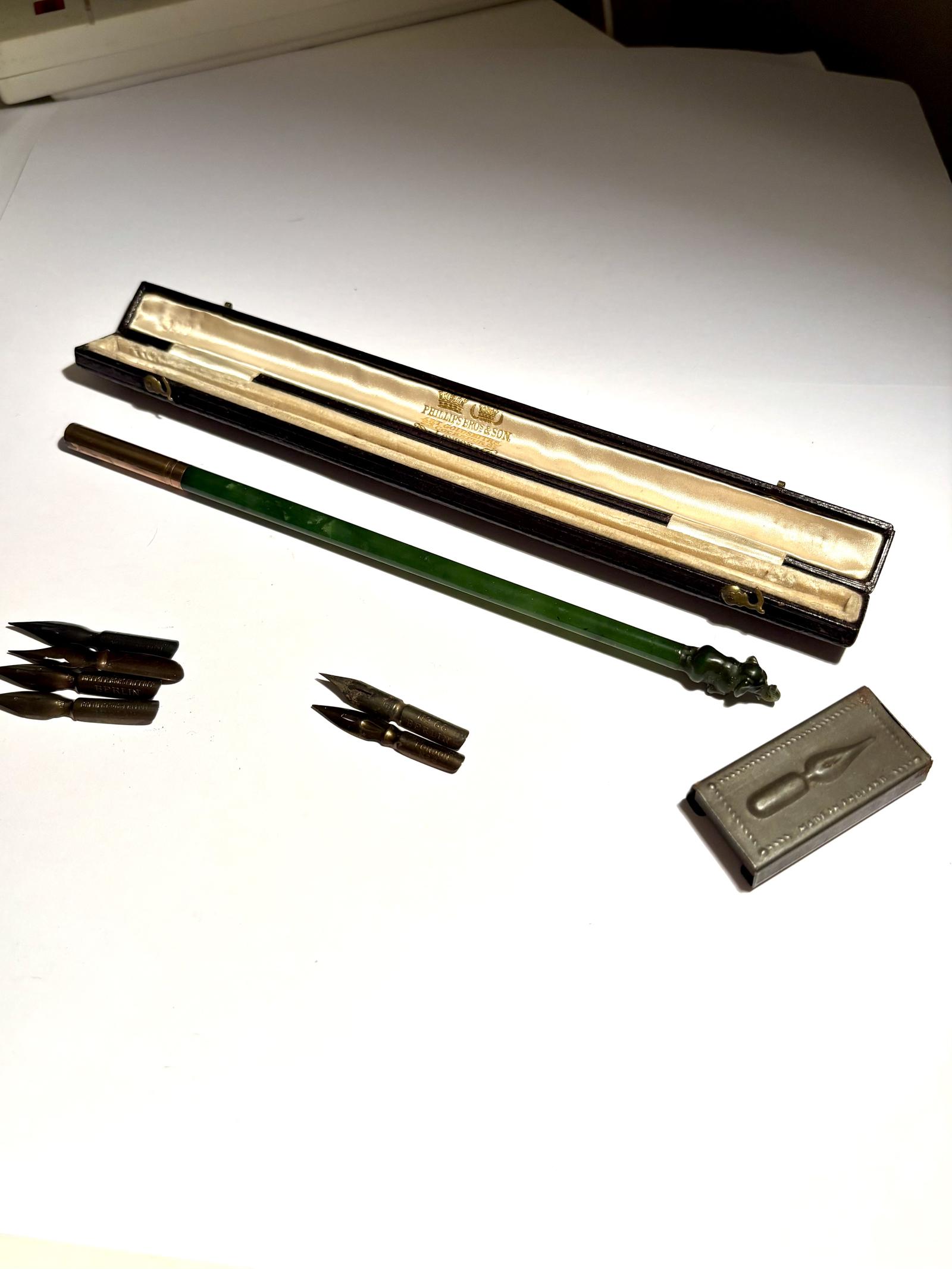 Mid Victorian Dip Pen & 6 Nibs Green Glass Elephant PHILLIPS BROS LONDON Cased (1 of 24) Mid Victorian Dip Pen & 6 Nibs Green Glass Elephant PHILLIPS BROS LONDON Cased (1 of 24)