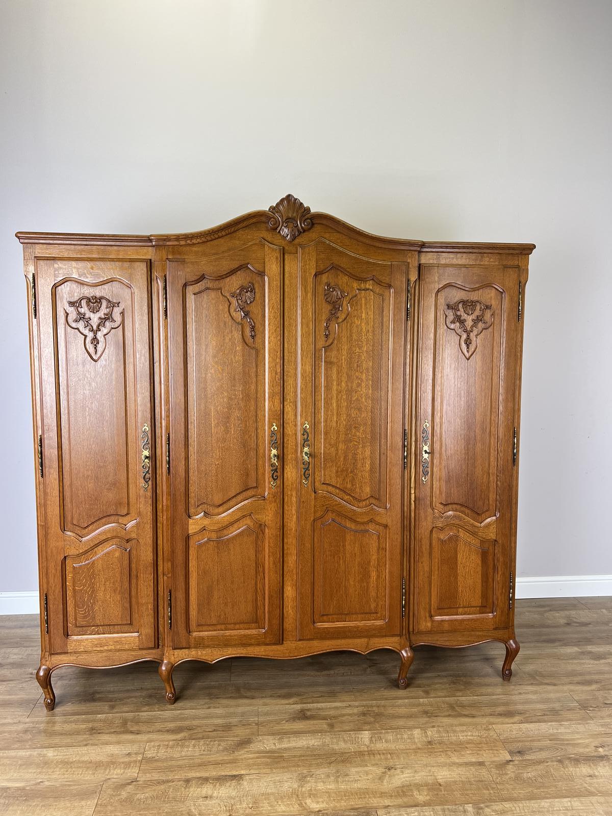 Wardrobe Vintage French Style Oak Four Door Carved Armoire (1 of 11) Wardrobe Vintage French Style Oak Four Door Carved Armoire (1 of 11)
