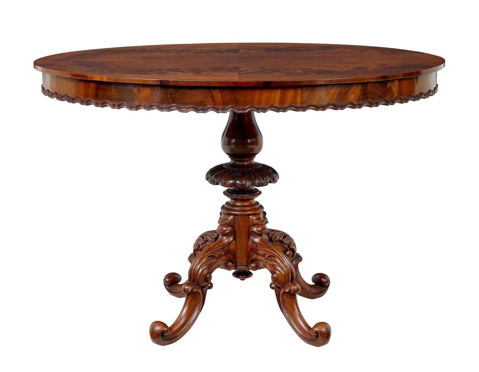 19th Century Carved Flame Mahogany Oval Center Table (1 of 8)
