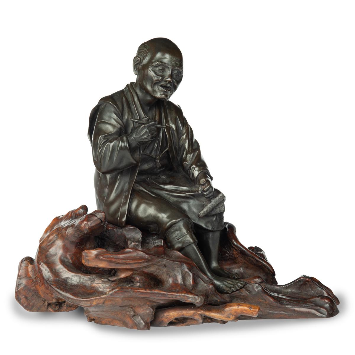 Meiji Period Bronze of a Seated Man Smoking (1 of 9)