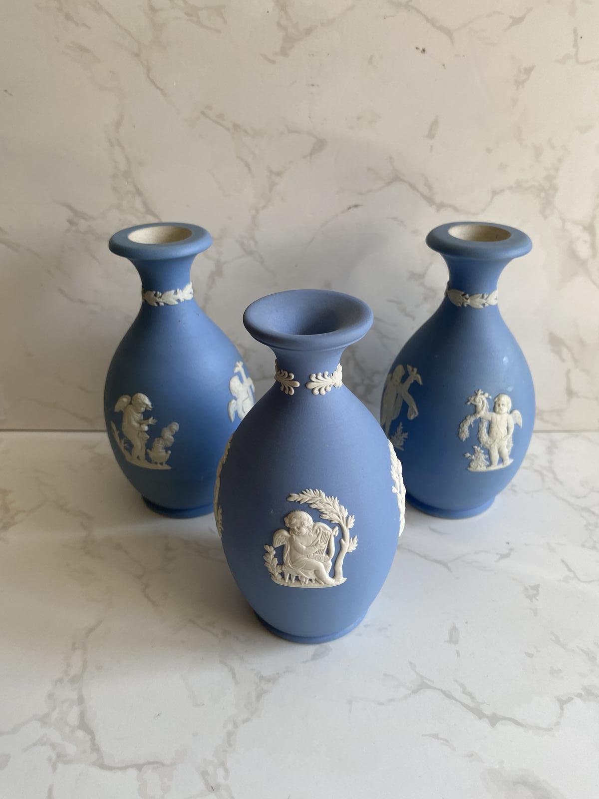 Wedgwood Jasperware Bud Vases Blue & White Cherub Relief Decoration (1 of 6) Wedgwood Jasperware Bud Vases Blue & White Cherub Relief Decoration (1 of 6)