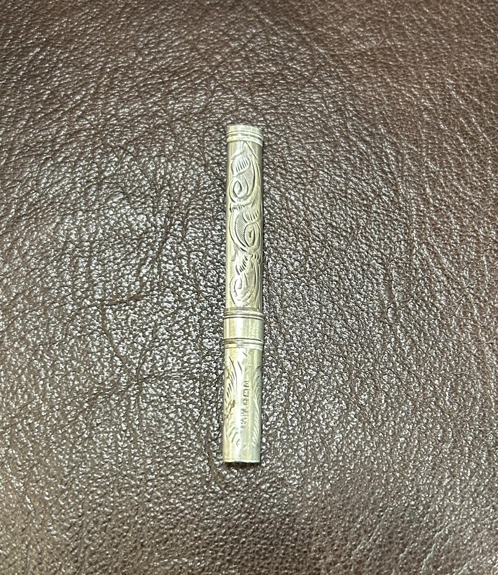 Silver Propelling Tooth Pick (1 of 3)