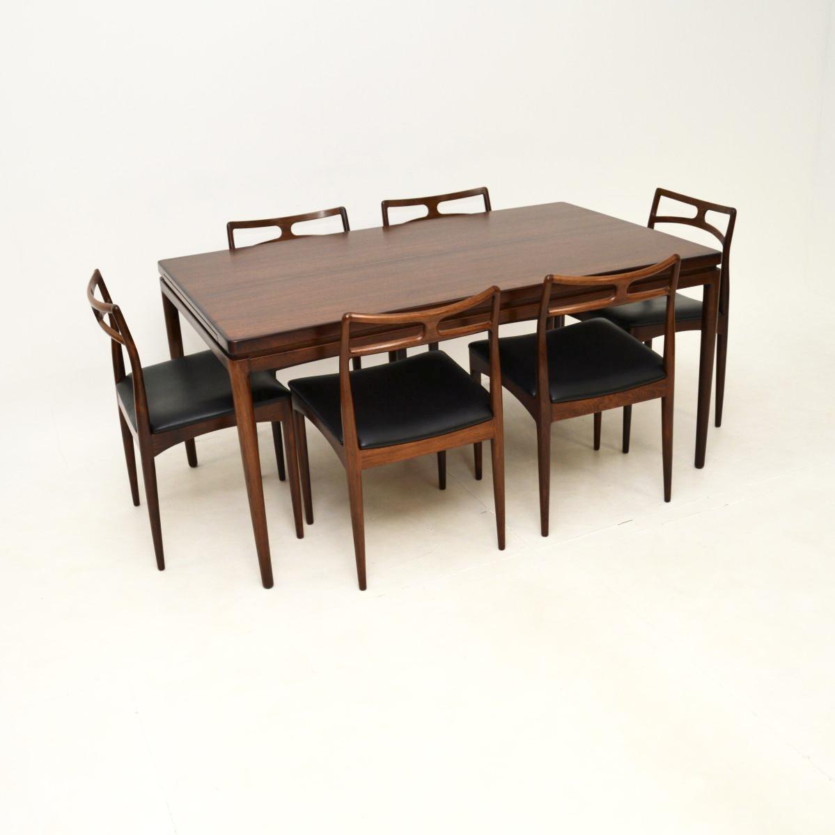 Danish Vintage Rosewood Dining Table & Chairs by Johannes Andersen for Christian Linneberg (1 of 17) Danish Vintage Rosewood Dining Table & Chairs by Johannes Andersen for Christian Linneberg (1 of 17)