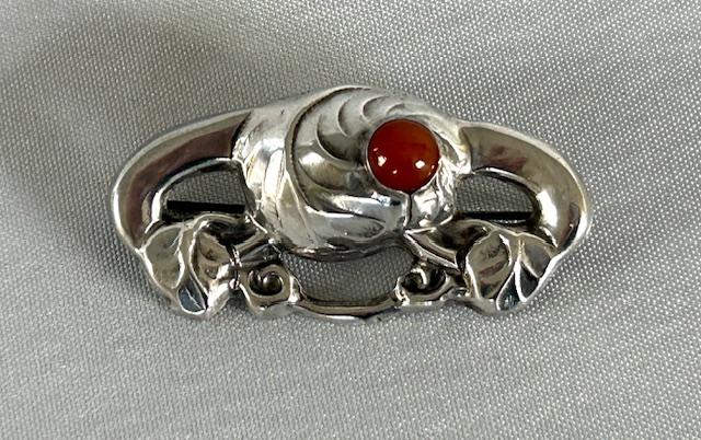 A Danish Skonvirke Arts & Crafts Silver & Carnelian Brooch (1 of 5) A Danish Skonvirke Arts & Crafts Silver & Carnelian Brooch (1 of 5)