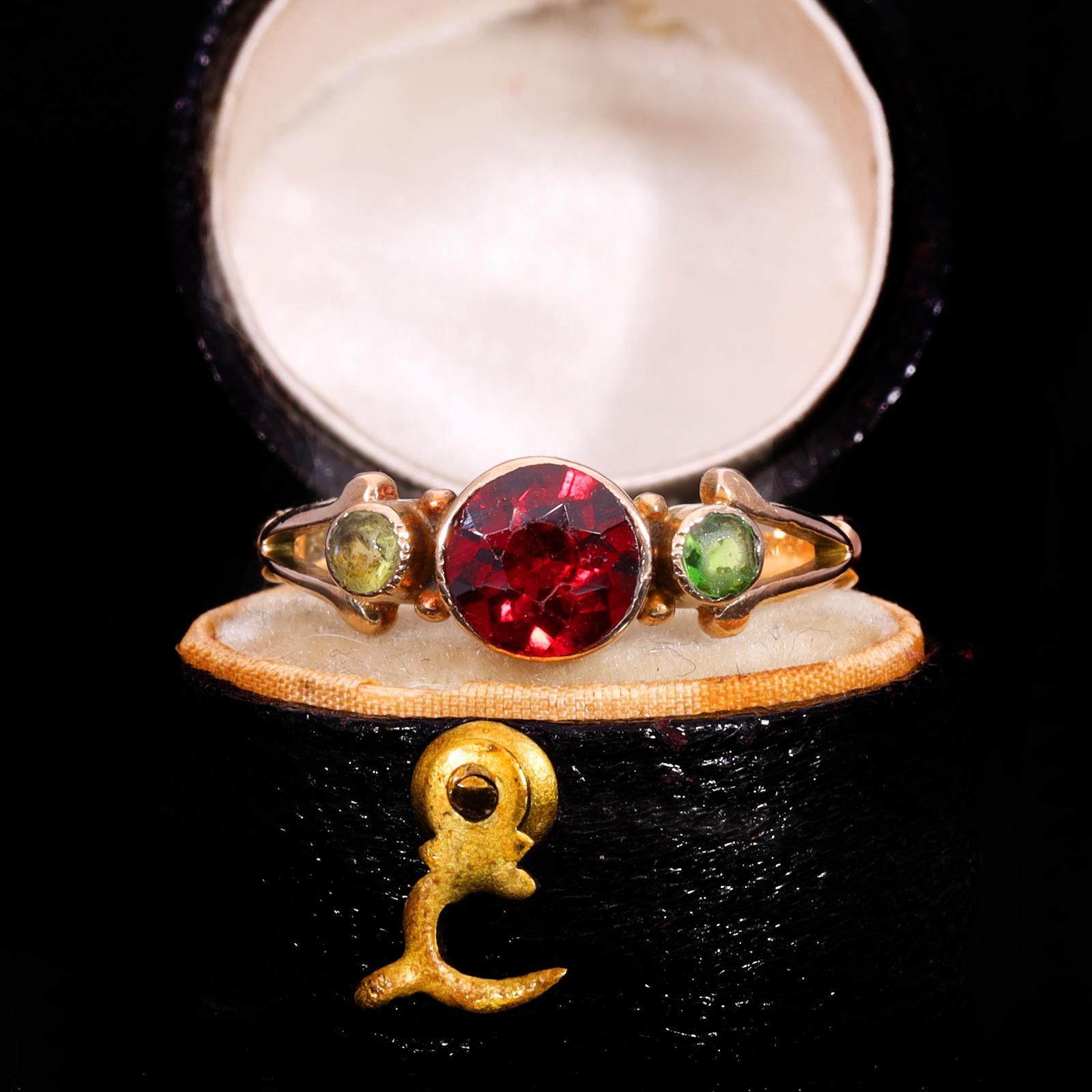 The Antique 1911 Garnet & Peridot Three Stone Ring (1 of 9) The Antique 1911 Garnet & Peridot Three Stone Ring (1 of 9)