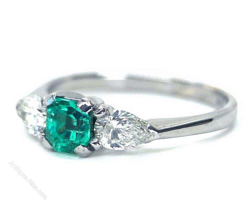 Emerald & Pear Shape Diamond 3 Stone Ring (1 of 3) Emerald & Pear Shape Diamond 3 Stone Ring (1 of 3)