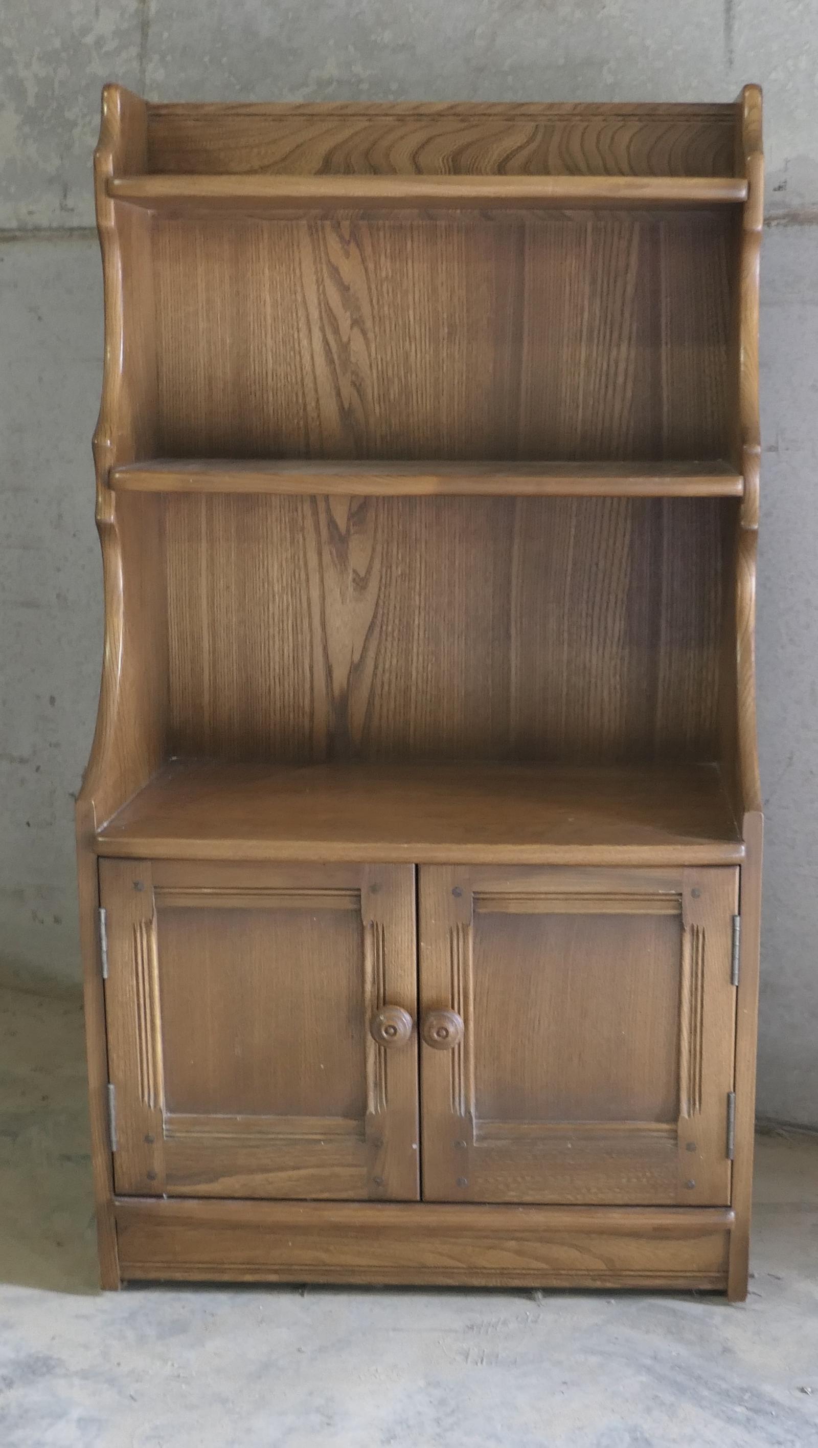Ercol Waterfall Golden Elm Bookcase with Cupboard (1 of 7) Ercol Waterfall Golden Elm Bookcase with Cupboard (1 of 7)