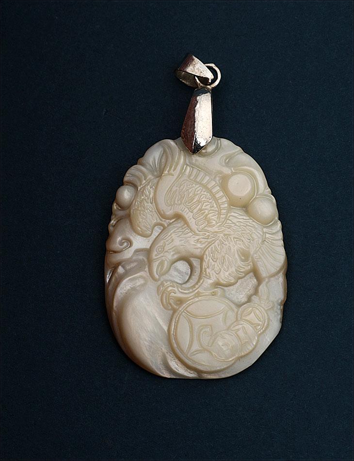 Japanese Mother of Pearl Amulet with Hawk and Shippō Symbol, Circa 1970 (1 of 3)