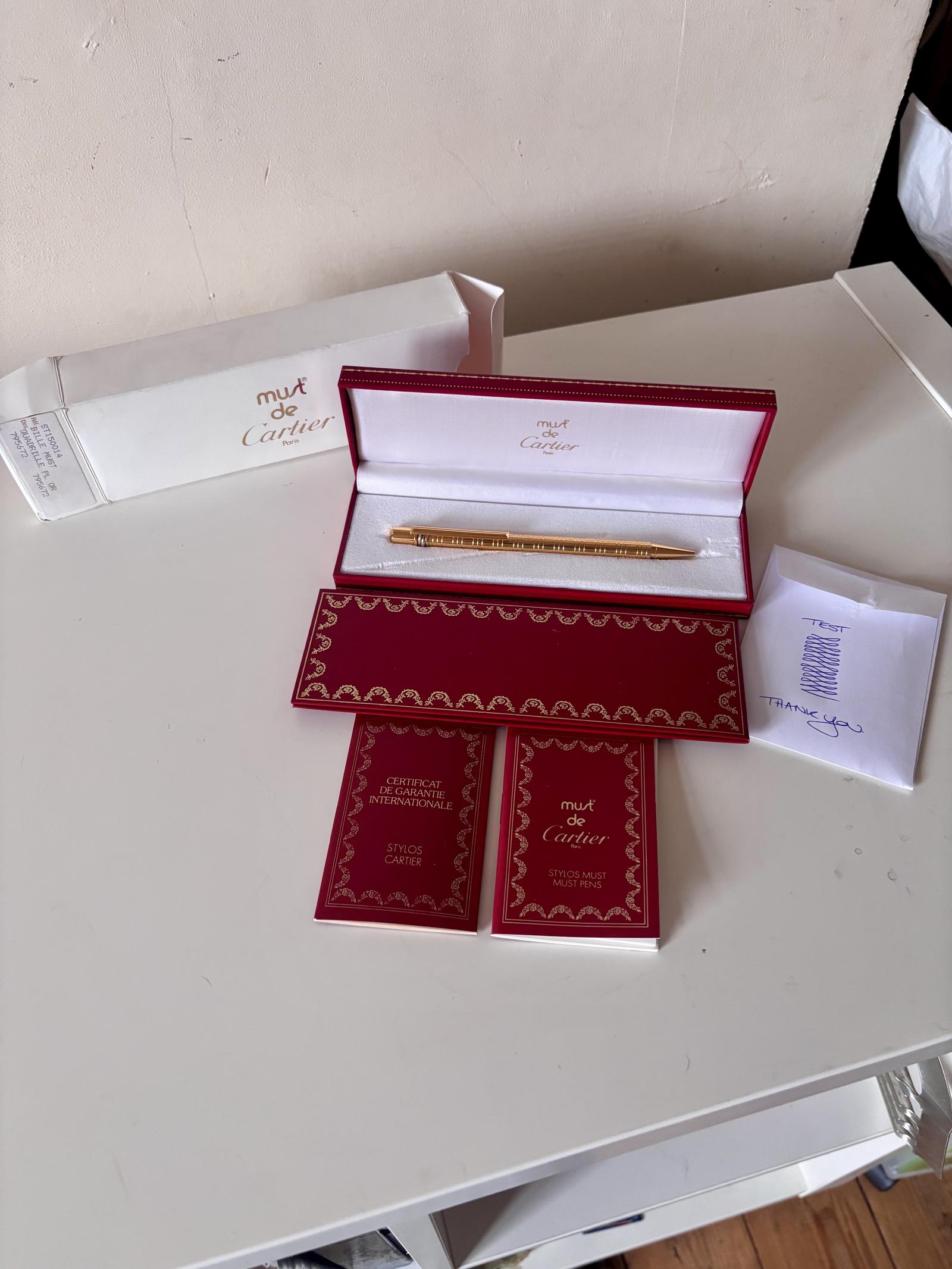 Must de Cartier Paris Gold Plated Ballpoint Pen ST150014 Guarantee & Boxes (1 of 17) Must de Cartier Paris Gold Plated Ballpoint Pen ST150014 Guarantee & Boxes (1 of 17)