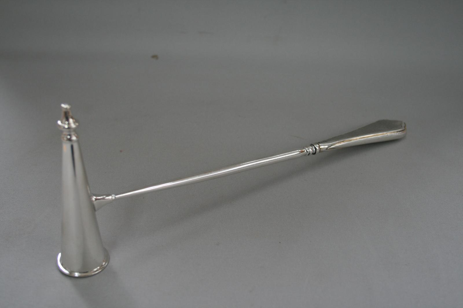 A Silver Handled Candle Snuffer (1 of 3) A Silver Handled Candle Snuffer (1 of 3)