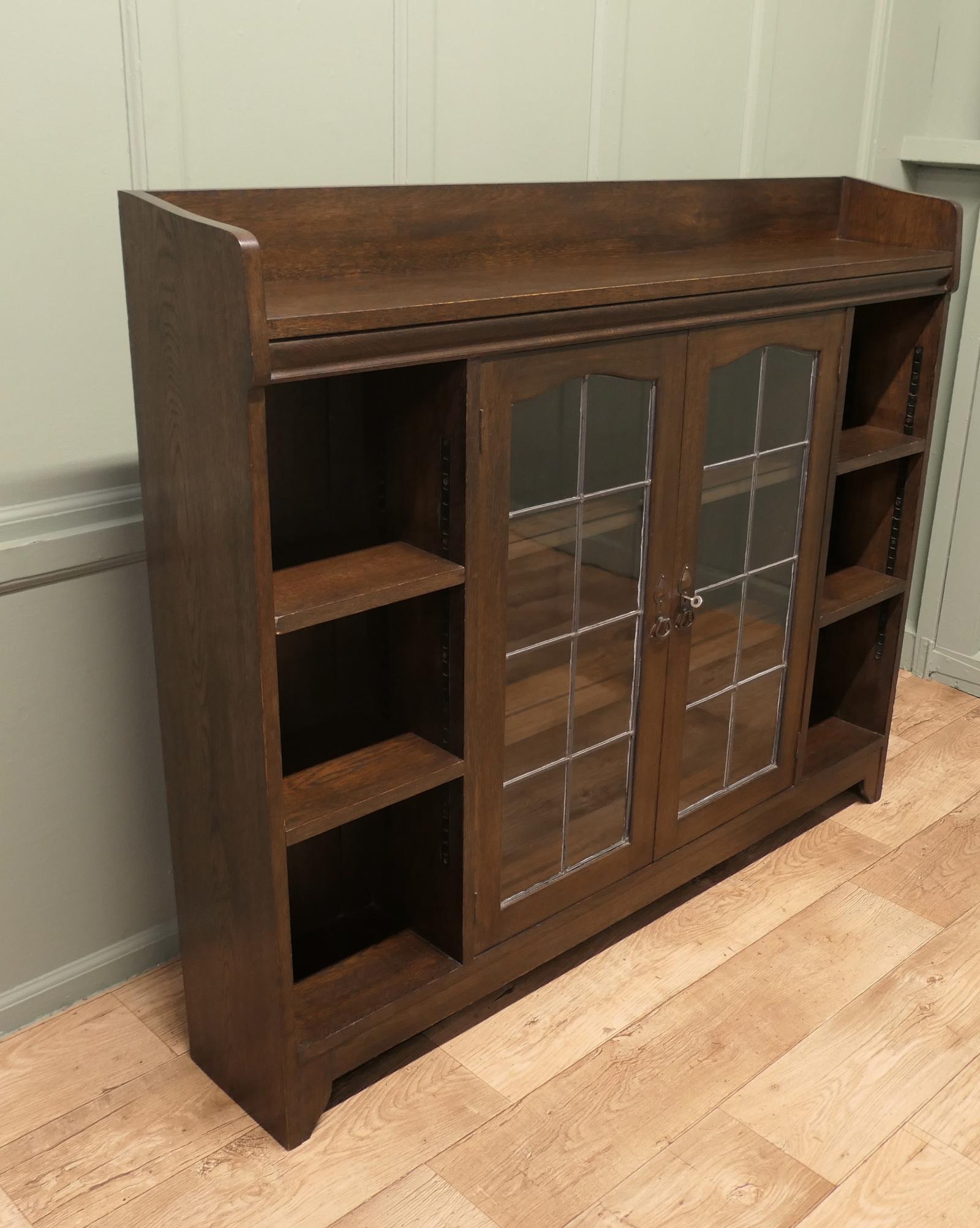 Arts and Crafts Glazed Liberty Bookcase with Open Shelving (1 of 7) Arts and Crafts Glazed Liberty Bookcase with Open Shelving (1 of 7)