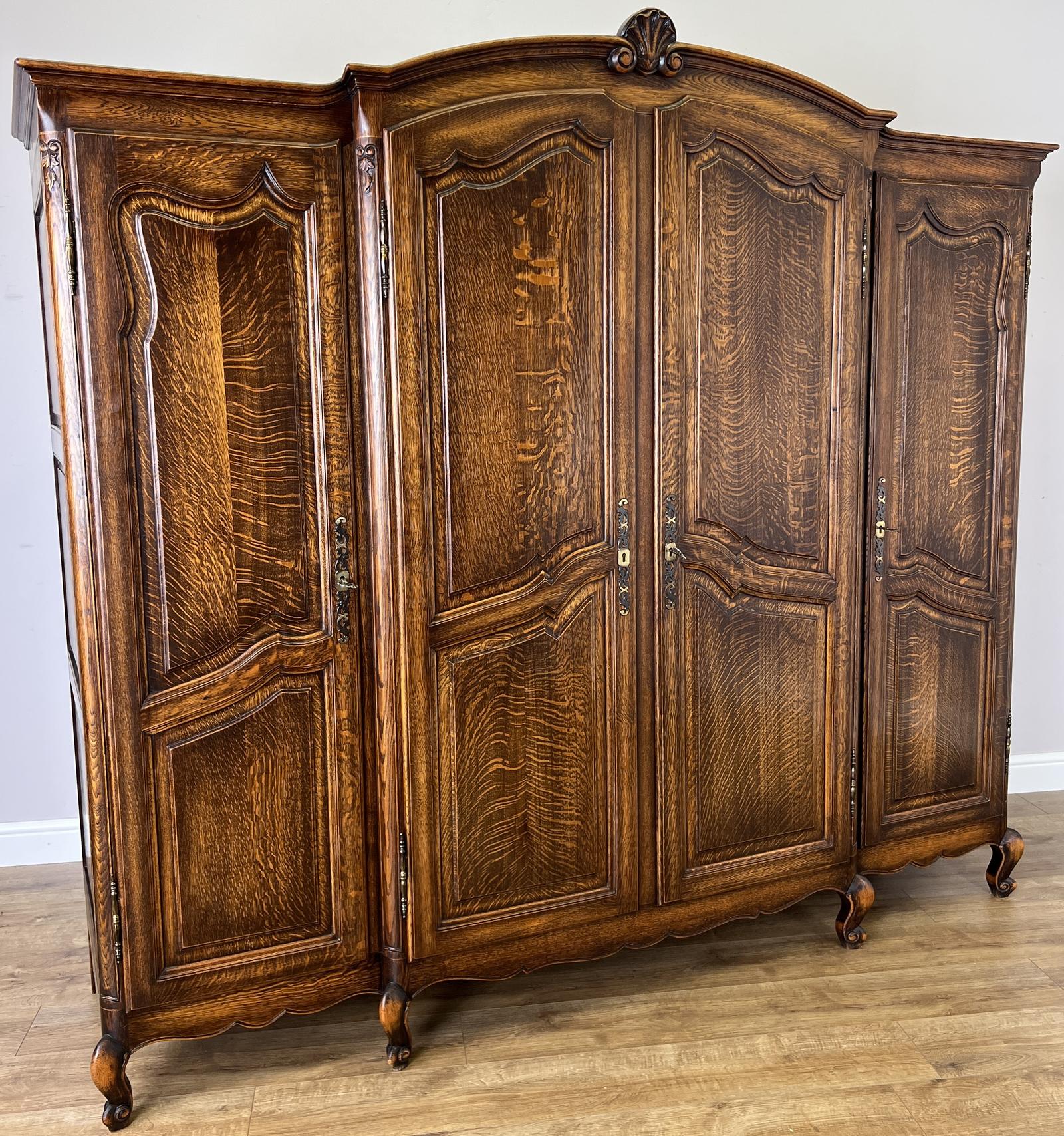 Wardrobe Vintage French Oak Style Four Door Carved Armoire (1 of 12) Wardrobe Vintage French Oak Style Four Door Carved Armoire (1 of 12)
