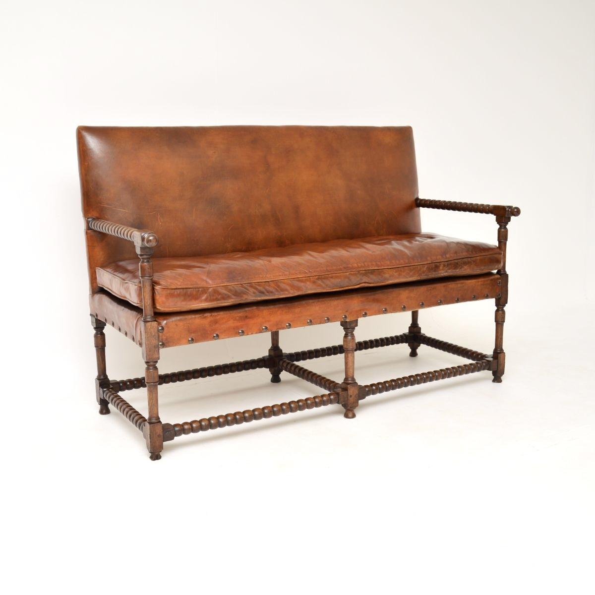 Antique Leather and Carved Oak Bobbin Sofa (1 of 12) Antique Leather and Carved Oak Bobbin Sofa (1 of 12)