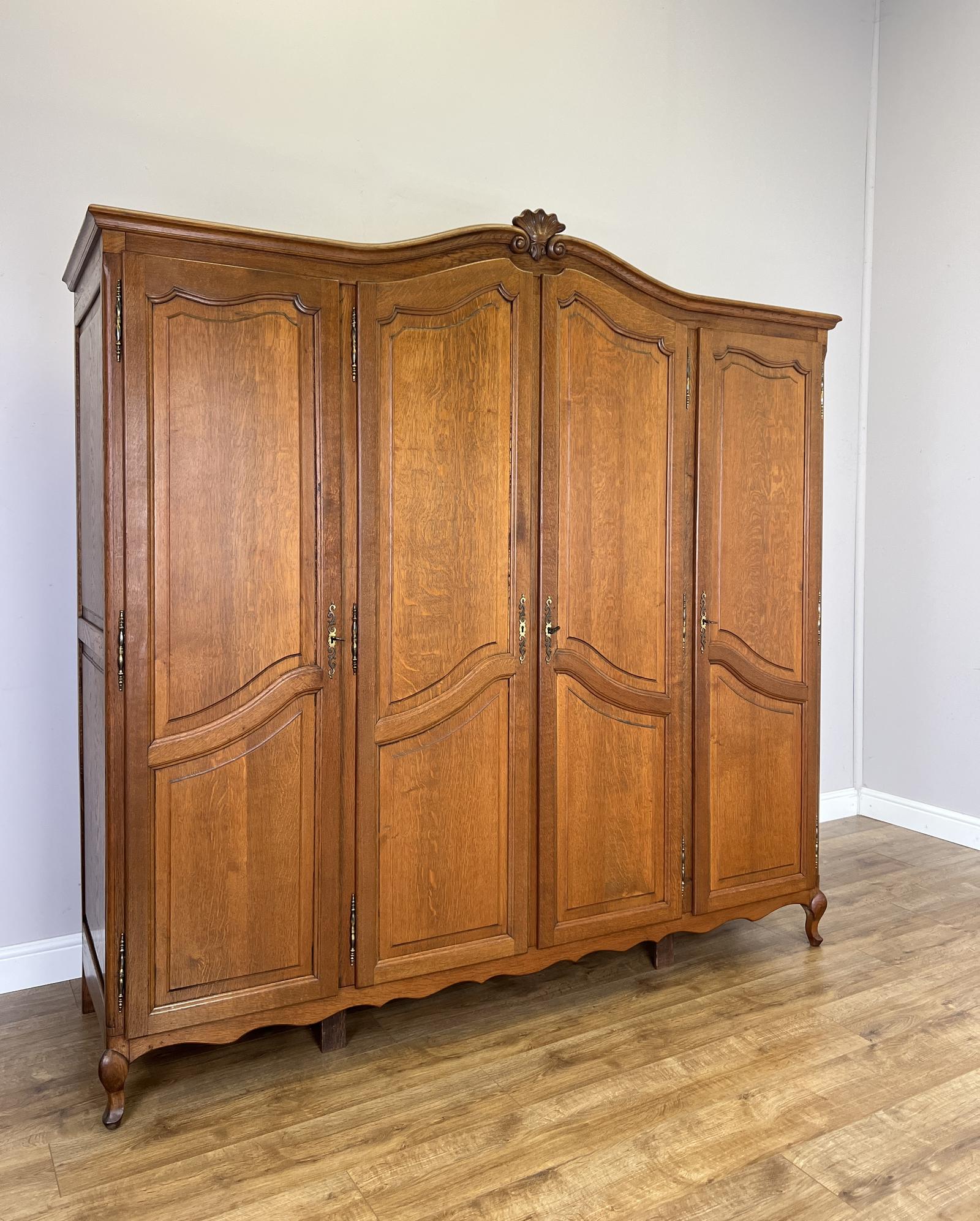 Wardrobe Vintage French Oak Four Door Carved Armoire (1 of 13) Wardrobe Vintage French Oak Four Door Carved Armoire (1 of 13)