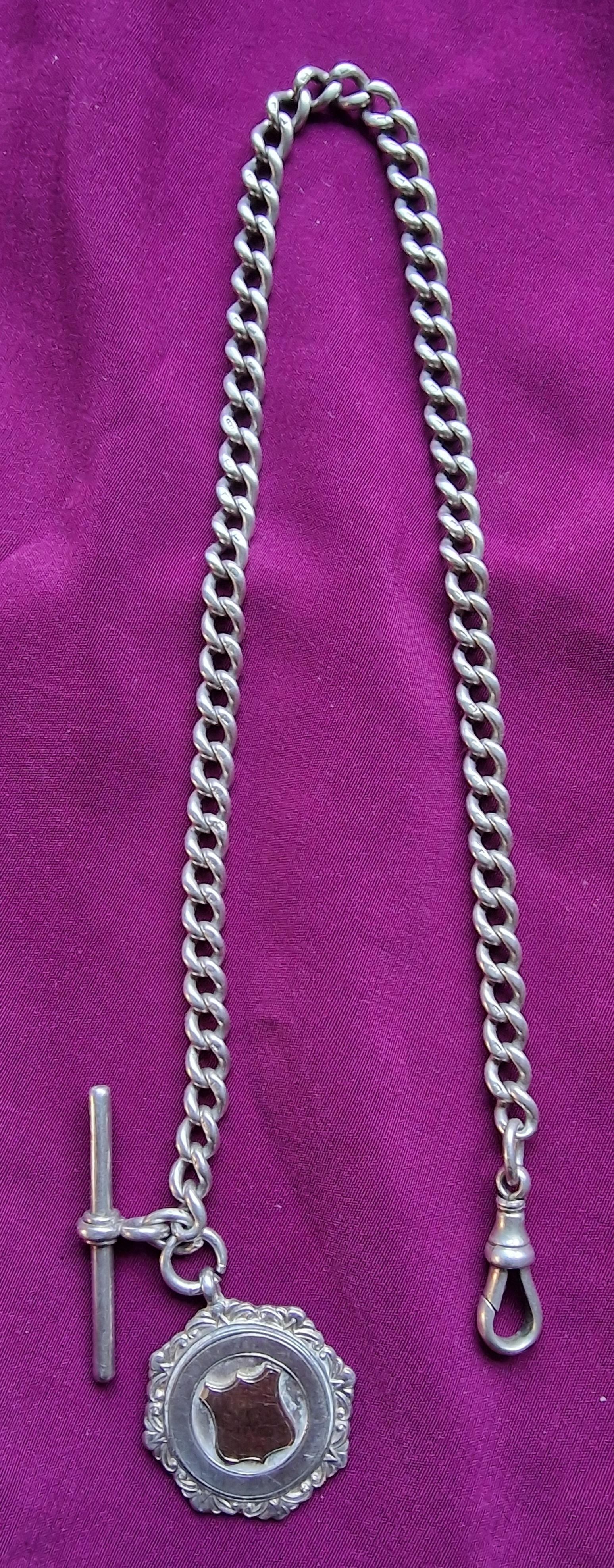 A Silver Pocket Watch Chain (1 of 3) A Silver Pocket Watch Chain (1 of 3)