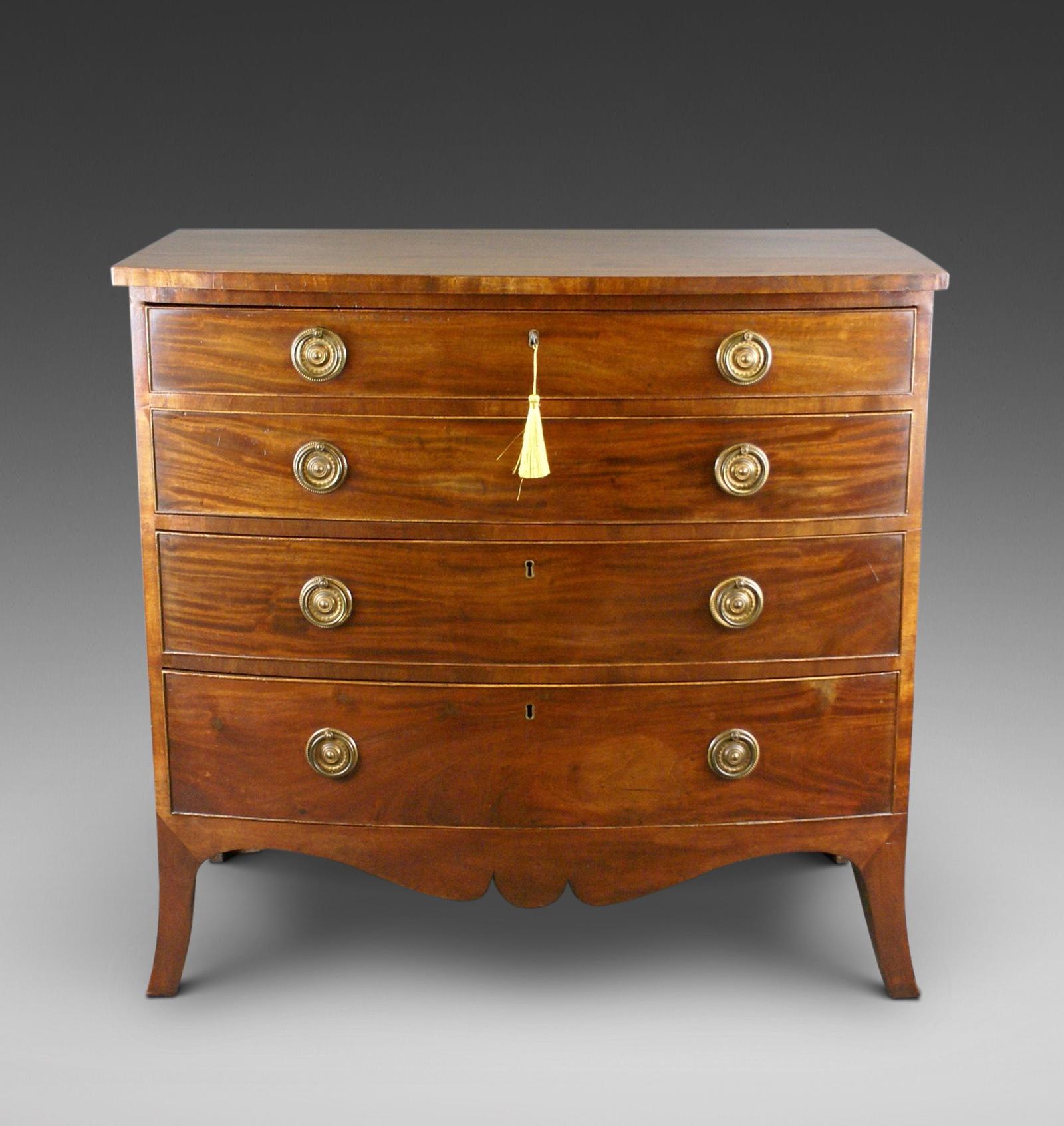 An Elegant Georgian Bow-front Chest (1 of 7)