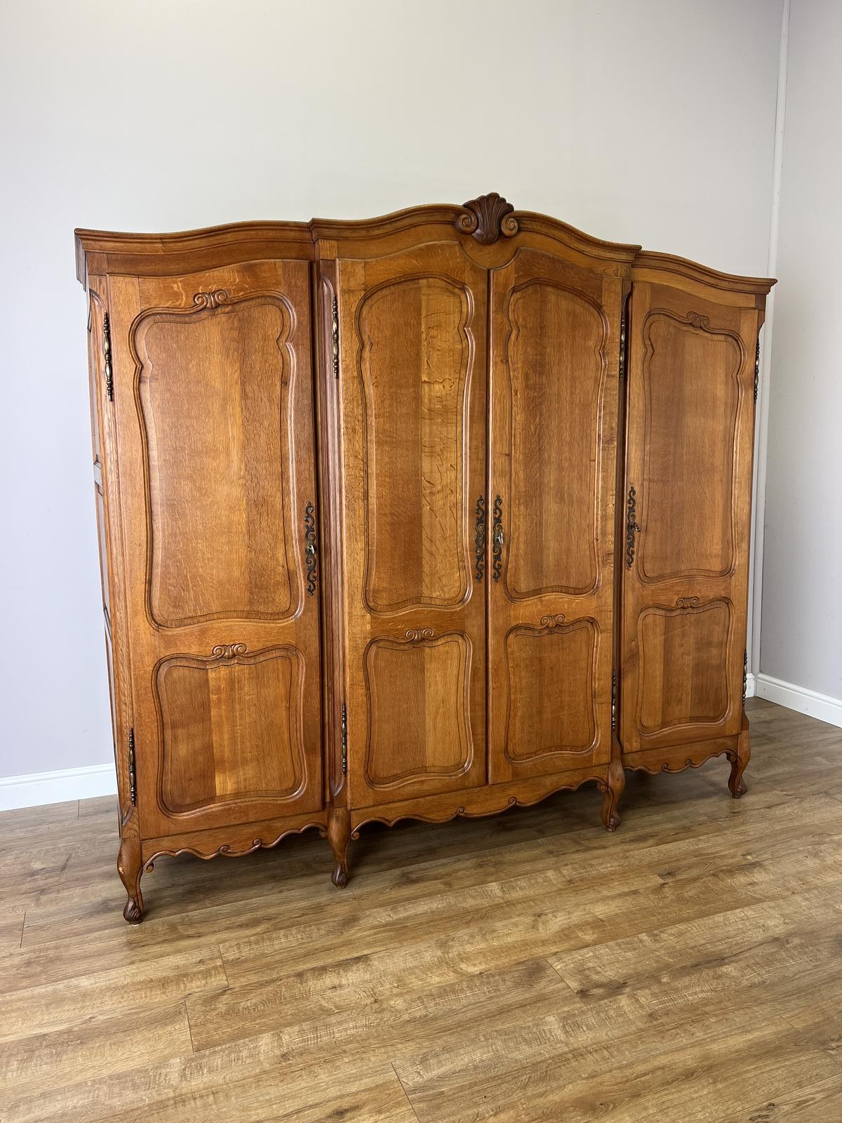 Wardrobe Vintage French Style Oak Four Door Carved Armoire (1 of 17) Wardrobe Vintage French Style Oak Four Door Carved Armoire (1 of 17)
