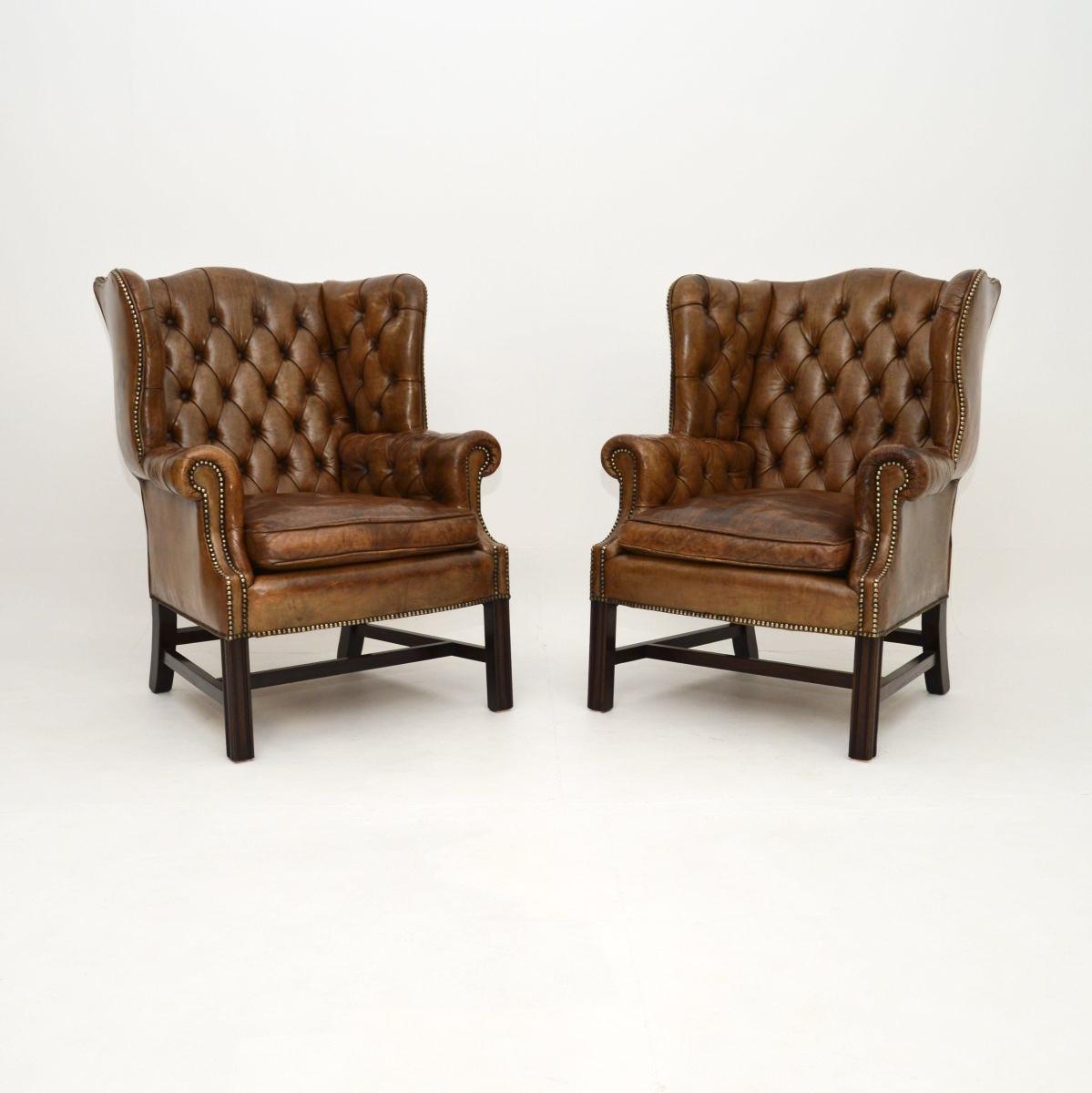 Pair of Antique Deep Buttoned Leather Wing Back Armchairs (1 of 9) Pair of Antique Deep Buttoned Leather Wing Back Armchairs (1 of 9)