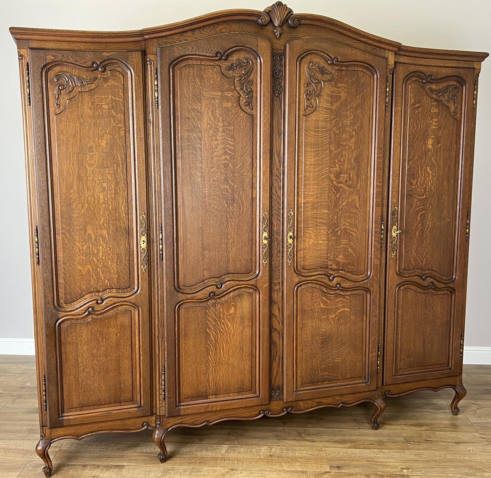 Wardrobe Vintage French Style Oak Four Door Carved Armoire (1 of 12) Wardrobe Vintage French Style Oak Four Door Carved Armoire (1 of 12)