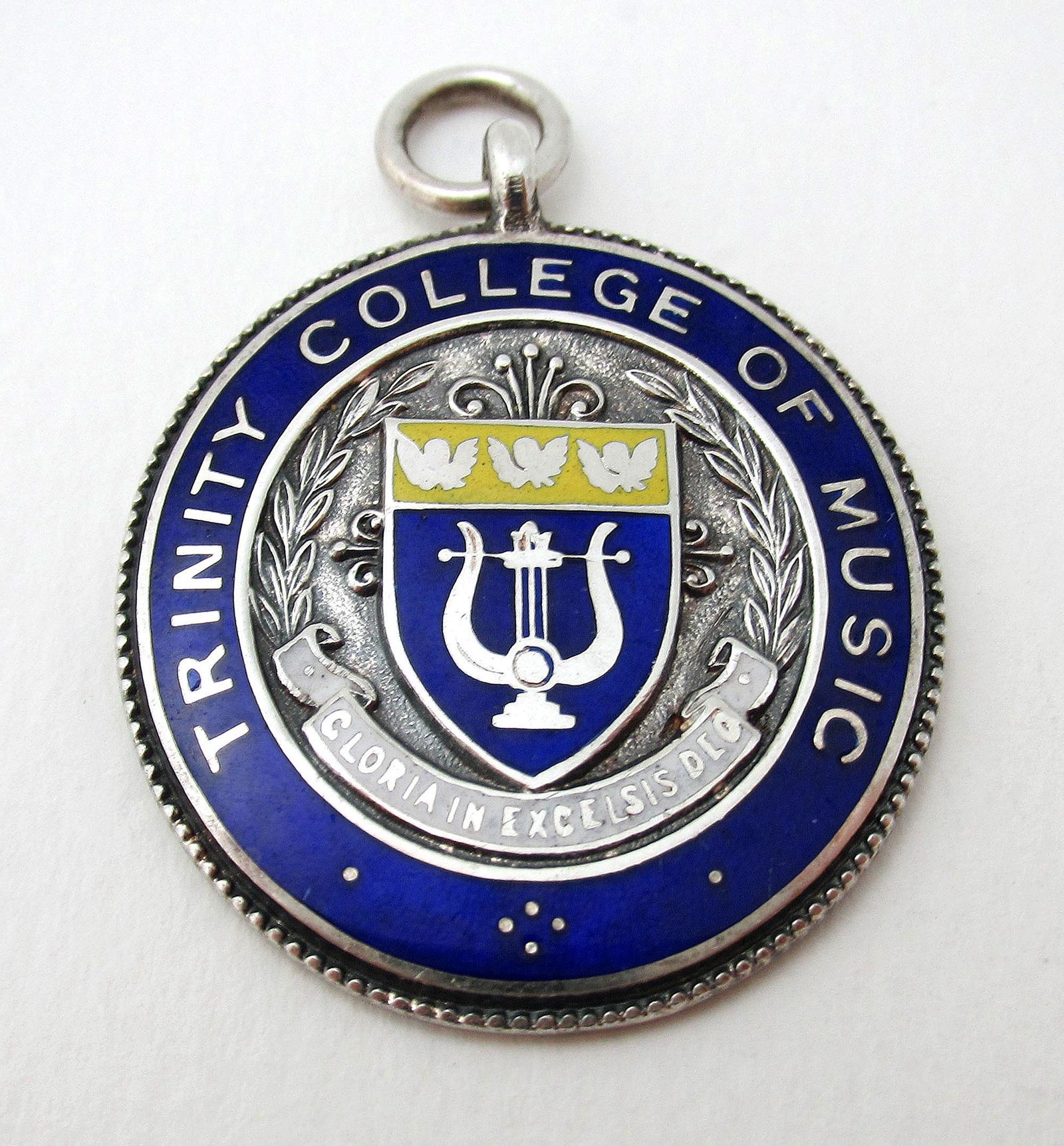 Vintage Trinity College of Music Solid Sterling Silver & Blue Enamel Circular Pocket Watch Fob Medal Pendant Birmingham 1944 (1 of 5) Vintage Trinity College of Music Solid Sterling Silver & Blue Enamel Circular Pocket Watch Fob Medal Pendant Birmingham 1944 (1 of 5)