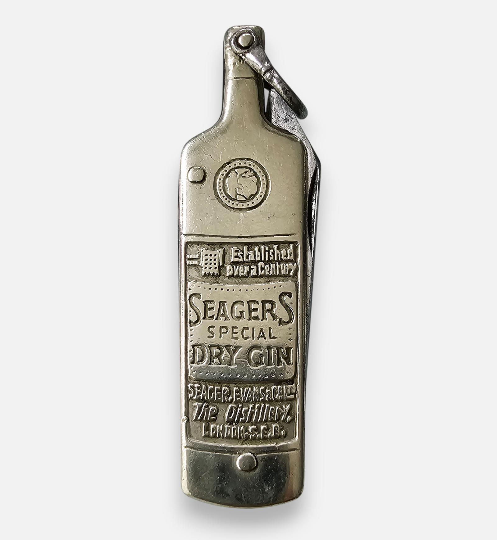 Novelty Antique Sheffield "Seager's Dry Gin" Bottle Advertising Penknife Folding Pocket Knife, SE8 London Interest (1 of 5) Novelty Antique Sheffield "Seager's Dry Gin" Bottle Advertising Penknife Folding Pocket Knife, SE8 London Interest (1 of 5)