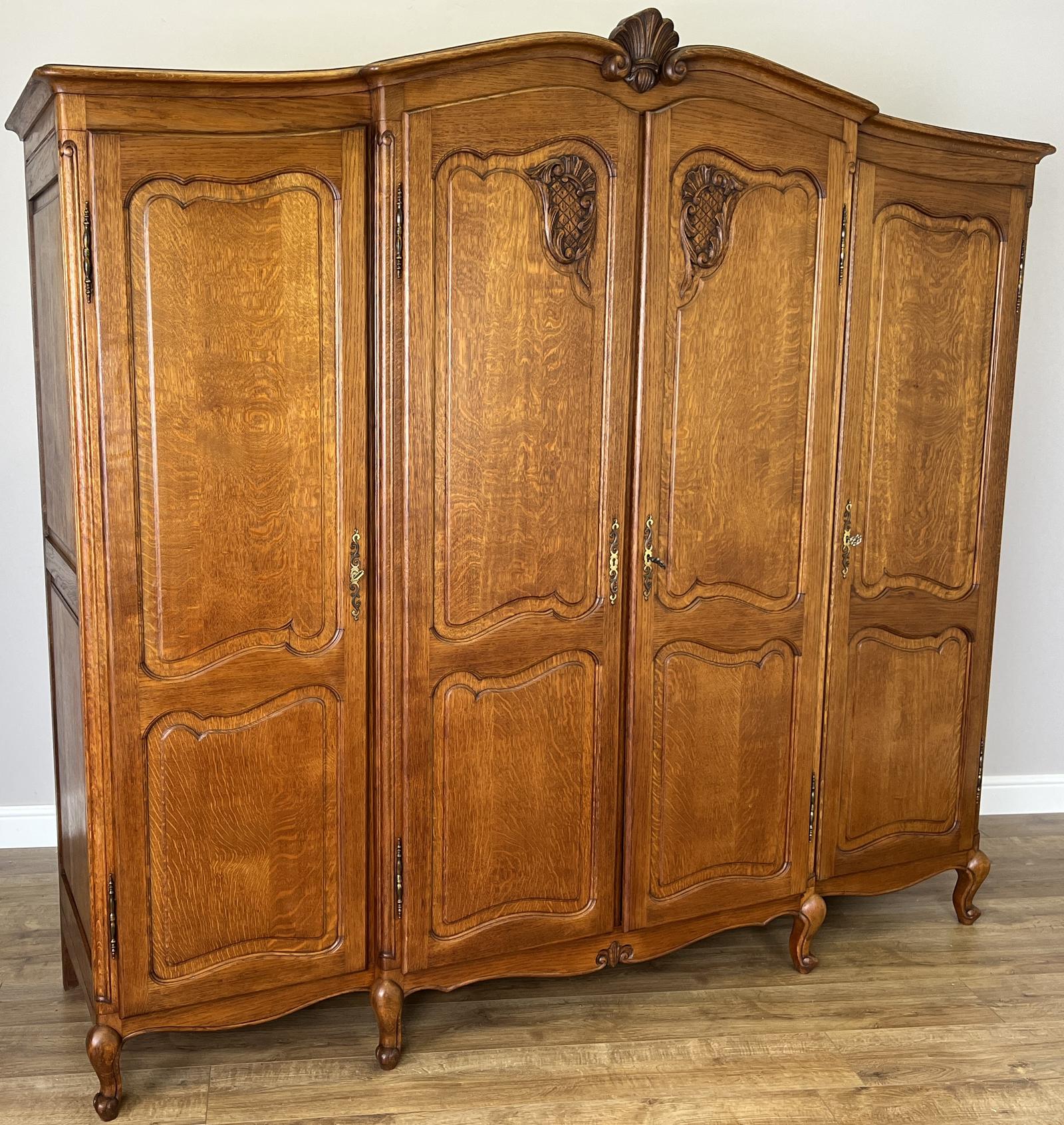 Wardrobe Vintage French Style Oak Four Door Carved Armoire (1 of 11) Wardrobe Vintage French Style Oak Four Door Carved Armoire (1 of 11)