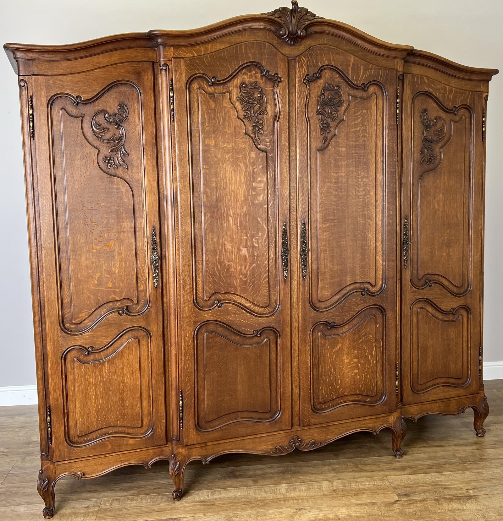 Wardrobe Vintage French Style Four Door Oak Carved Armoire (1 of 18) Wardrobe Vintage French Style Four Door Oak Carved Armoire (1 of 18)