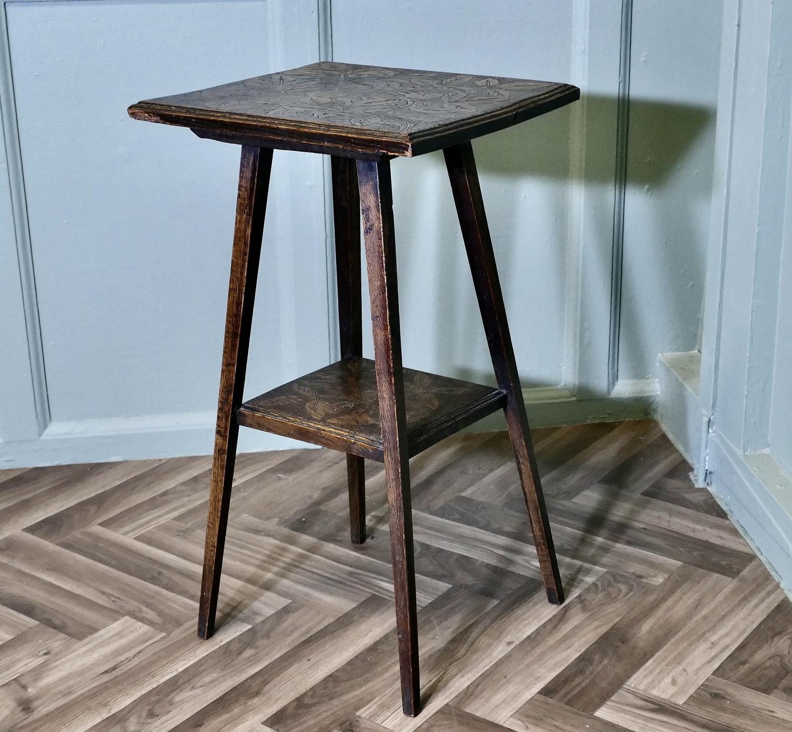 An Edwardian Carved Oak Etagere or Occasional Table (1 of 6)