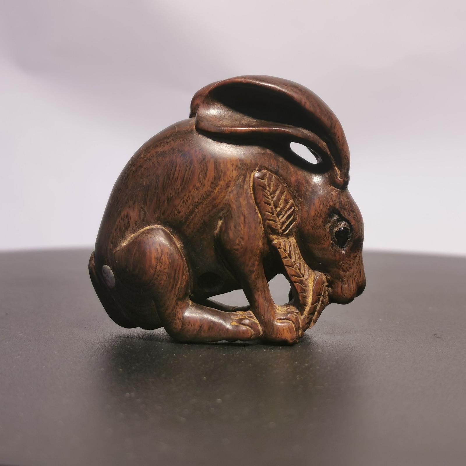 A Japanese Netsuke of an Eating Hare Made of Wood (1 of 7)