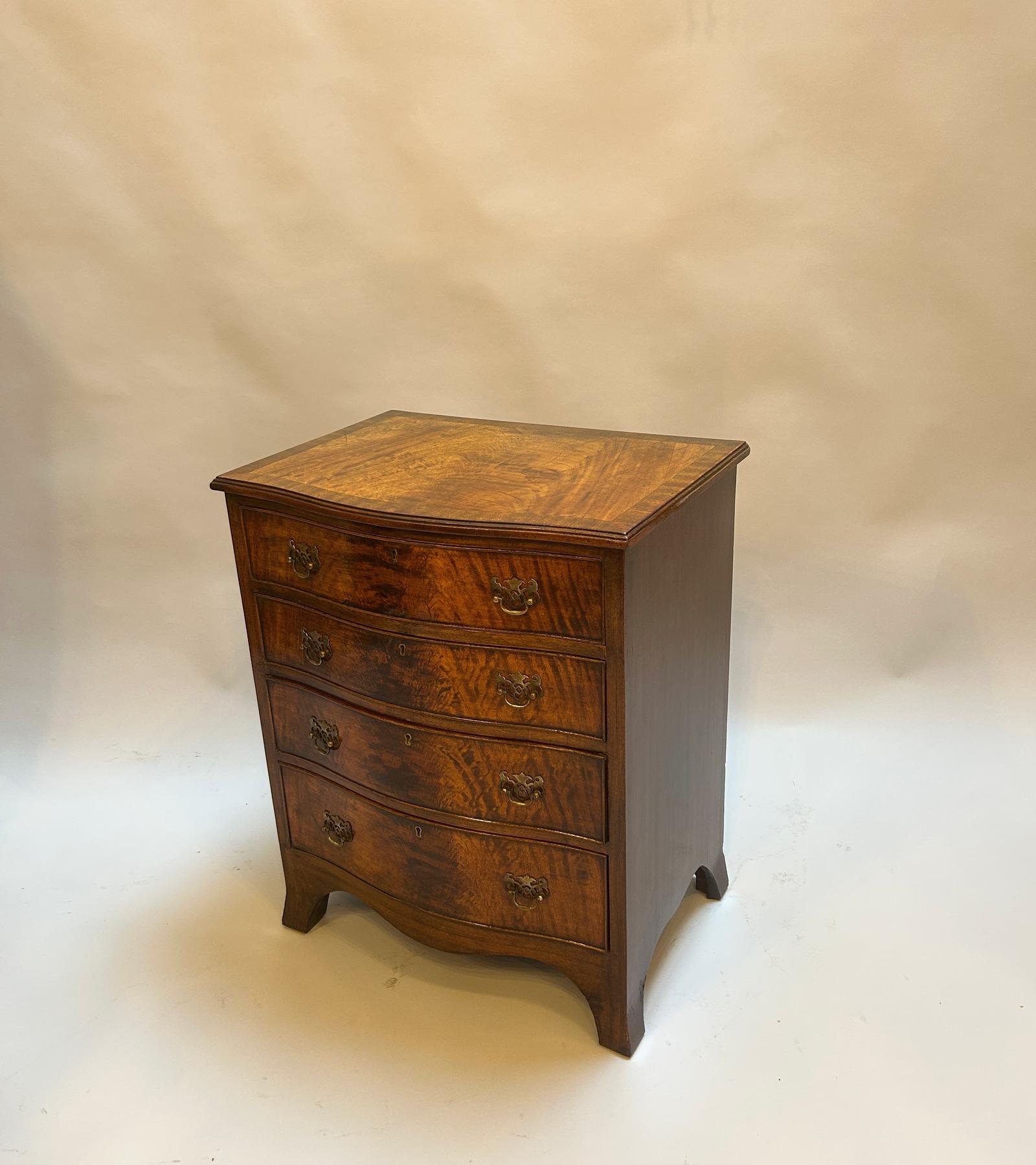 Early 20th Century Serpentine Chest of Drawers - main image