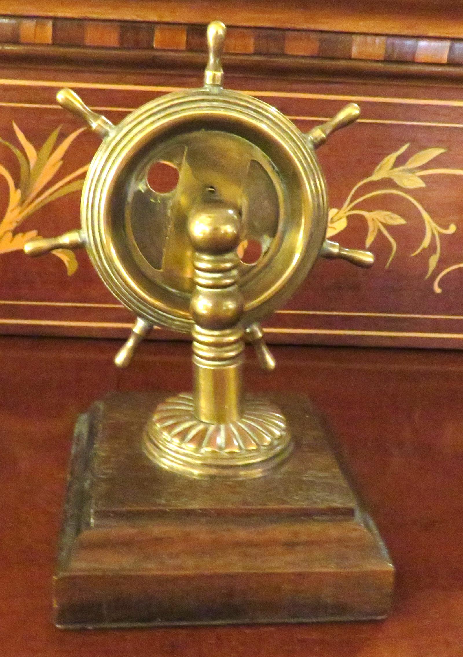 BRASS CIGAR CUTTER ON MAHOGANY WOODEN STAND (1 of 2)