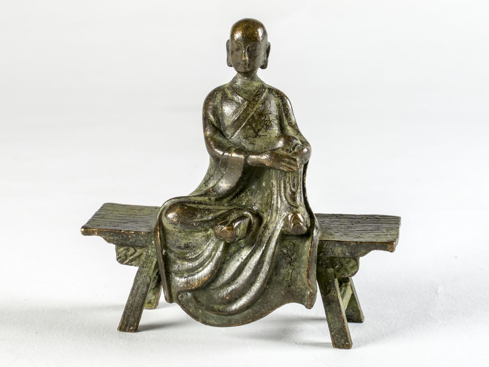 Bronze Buddhist Monk Meditating on Bench (1 of 5) Bronze Buddhist Monk Meditating on Bench (1 of 5)