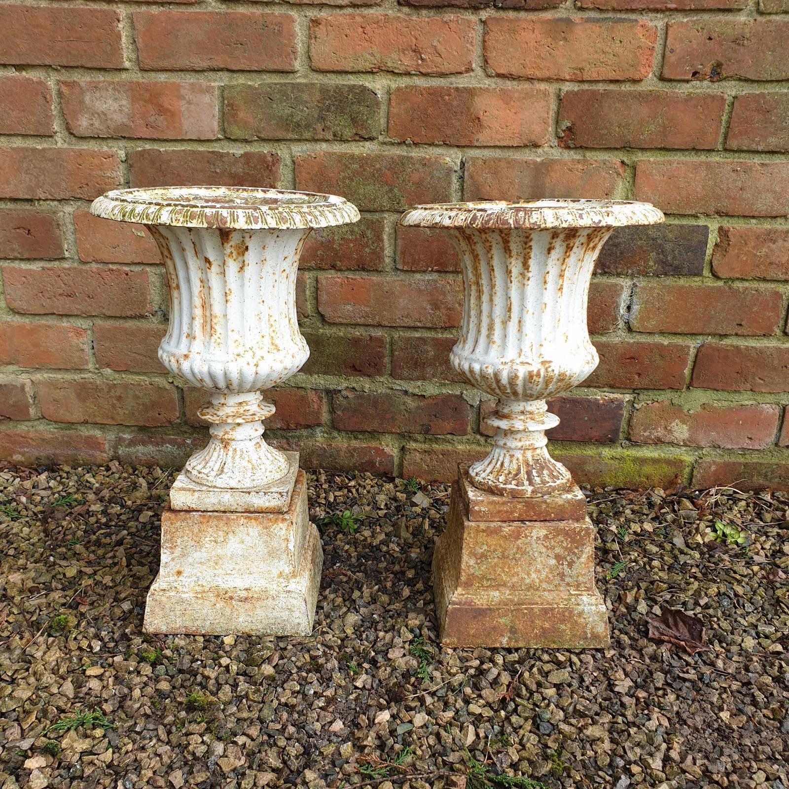 Pair of Cast Iron Urns on Plinths (1 of 6)