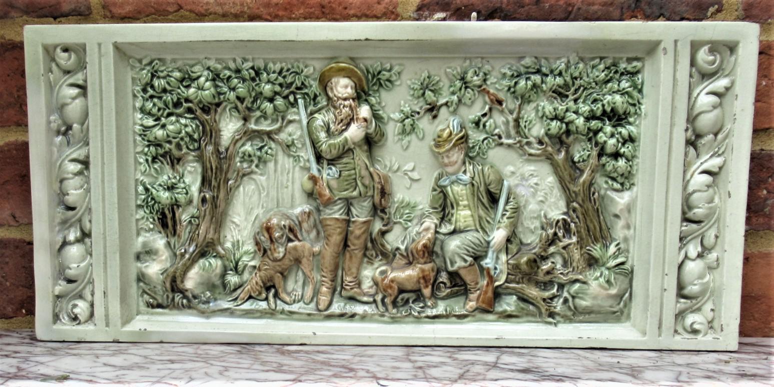 German or Austrian stove or fireplace faience tile with huntsmen & dogs c.1870 (1 of 13) German or Austrian stove or fireplace faience tile with huntsmen & dogs c.1870 (1 of 13)