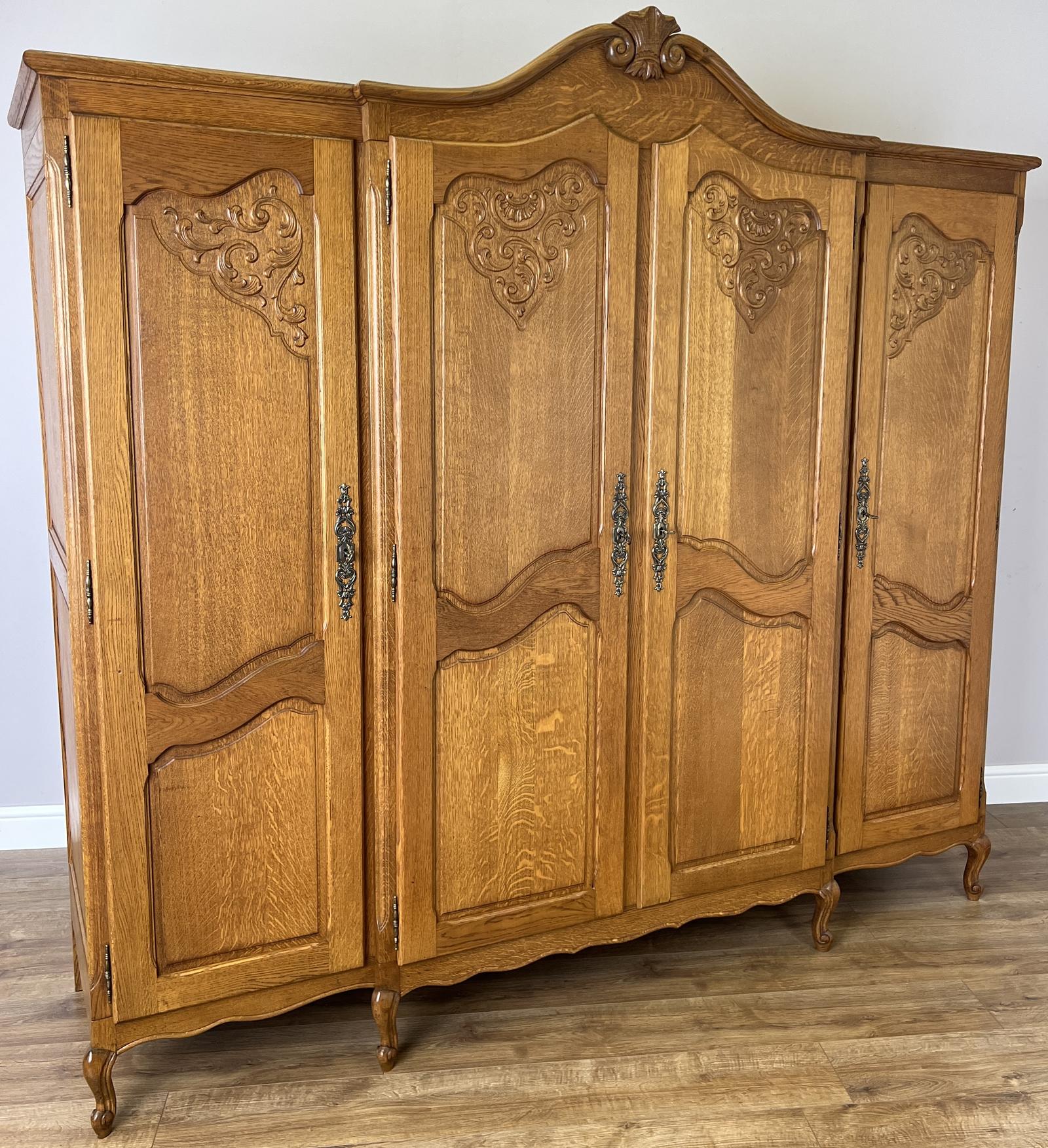 Wardrobe Vintage French Style Oak Four Door Carved Armoire (1 of 11) Wardrobe Vintage French Style Oak Four Door Carved Armoire (1 of 11)