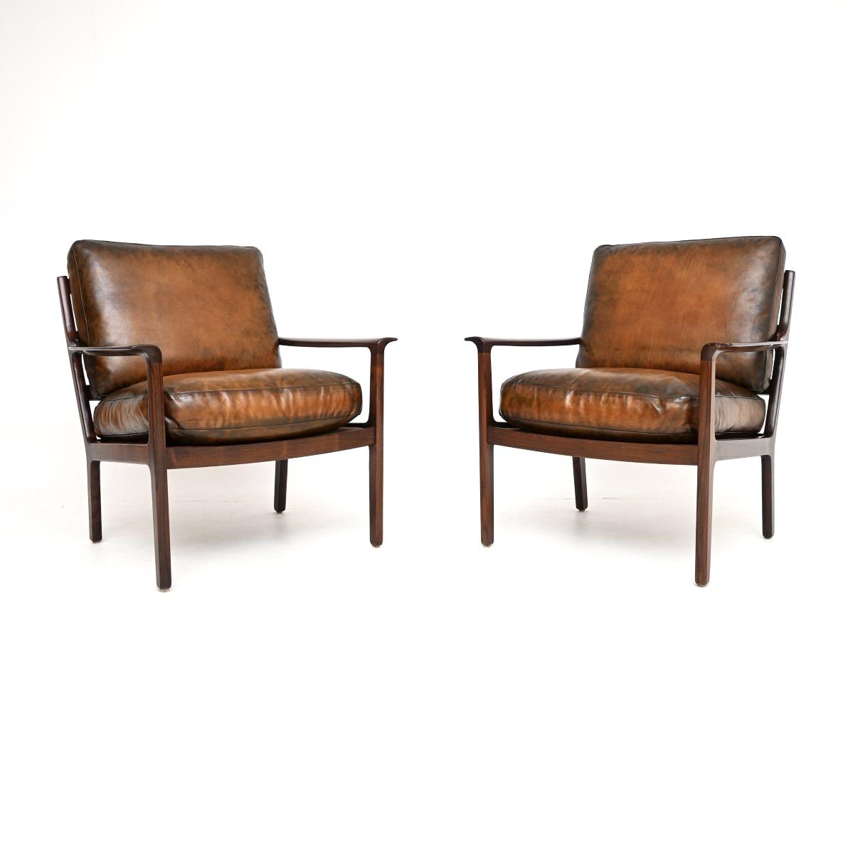 Pair of Vintage Scandinavian Rosewood and Leather Armchairs by Frederik Kayser (1 of 15) Pair of Vintage Scandinavian Rosewood and Leather Armchairs by Frederik Kayser (1 of 15)