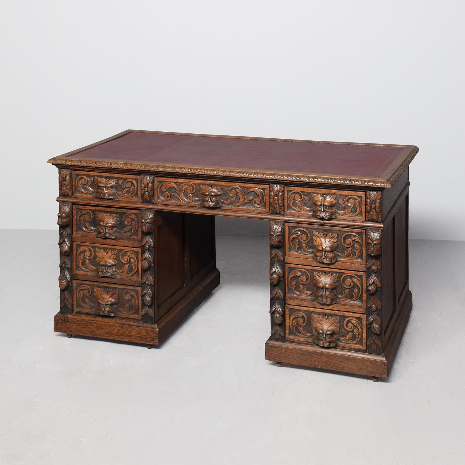 Large Victorian, One-piece Carved-oak Flemish Kneehole Writing Desk with Burgundy Red Leather Writing Surface (1 of 7) Large Victorian, One-piece Carved-oak Flemish Kneehole Writing Desk with Burgundy Red Leather Writing Surface (1 of 7)