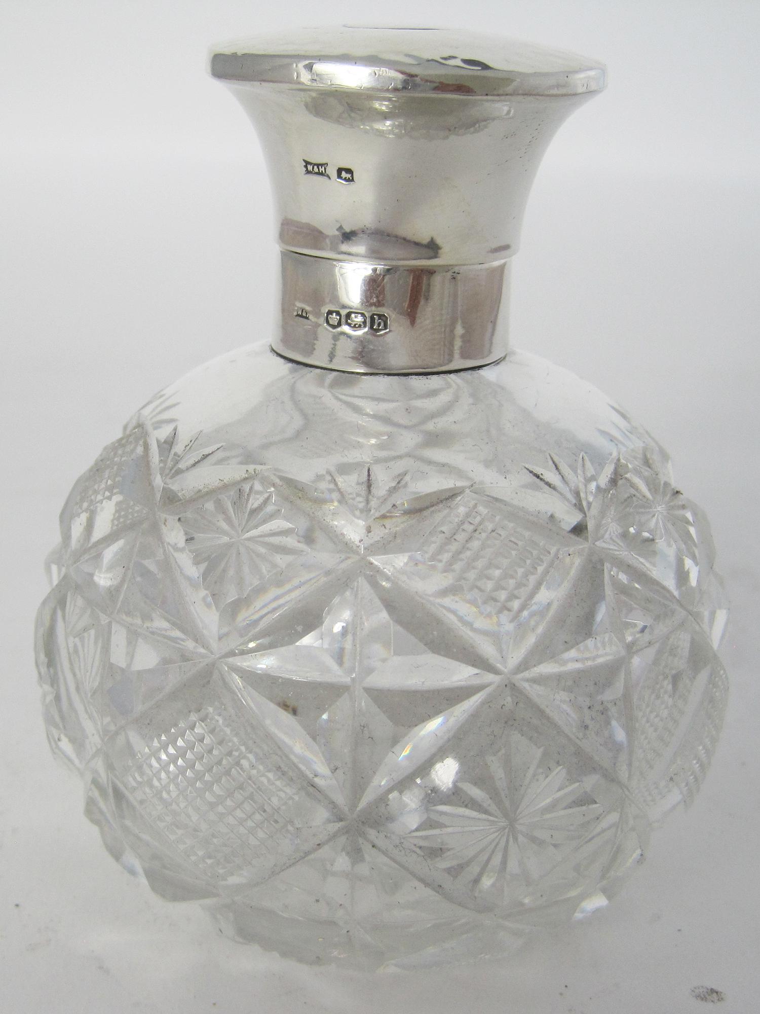 Silver Topped Perfume Bottle with a Hinged Circular Hammered Design Top (1 of 6)