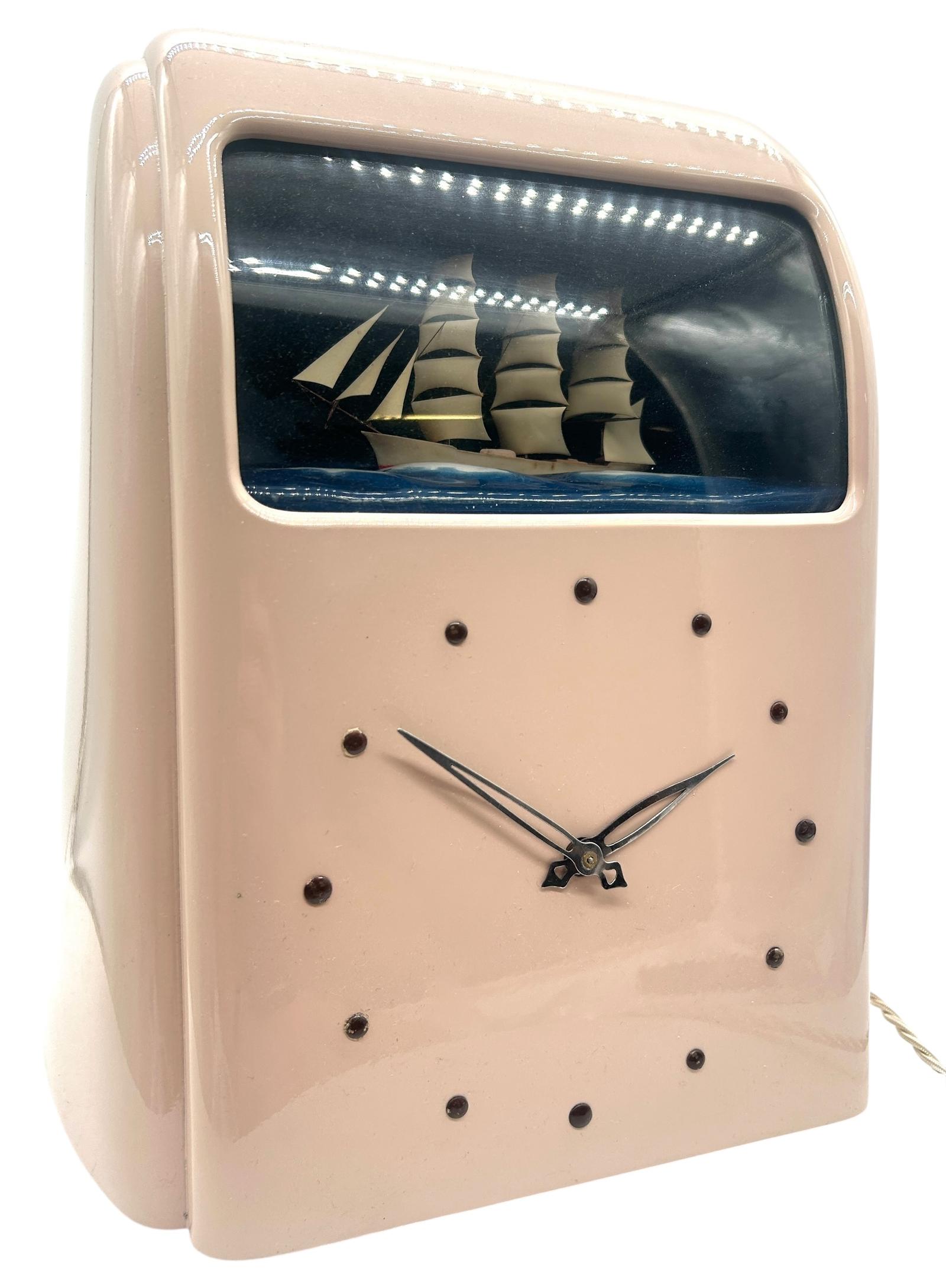 A 1940s Art Deco Clock by Vitascope – Rare Pink Model Rocking Ship Automation (1 of 7) A 1940s Art Deco Clock by Vitascope – Rare Pink Model Rocking Ship Automation (1 of 7)