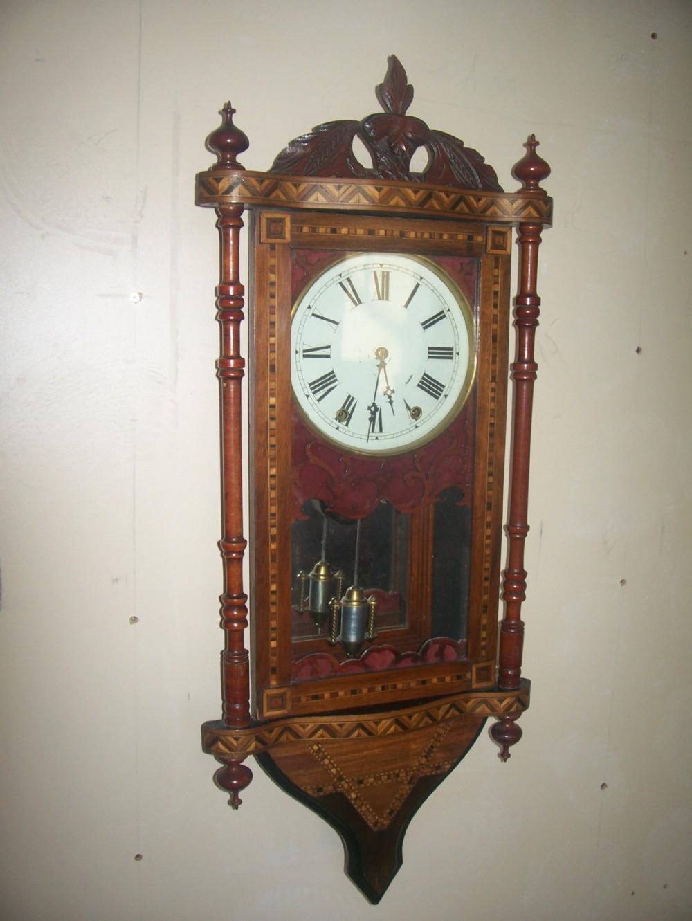 Fine American Specimien Woods Striking Wall Clock (1 of 1)